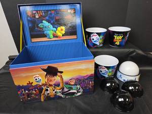lot 322 image: Toy Story 4 Theater Promotional Popcorn Buckets,  Lamp, and Toy Chest