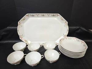 lot 338 image: MZ Austria Porcelain Serving Platter, 6 Tea Cups, and 6 Bowls