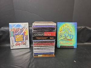 lot 347 image: New Wii High School Musical Sing It Game, The Land Far Beyond Book, and Mixed Genre CDs