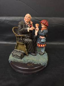 lot 385 image: 1998 Norman Rockwell The Doll Doctor Figurine