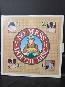 lot 402 image: No Mess Dough Disc with Pastry Cloth