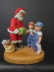 lot 406 image: 1983 Country Store Santa with Children Figurine by Home Interiors