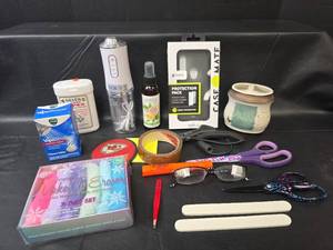lot 604 image: Make-Up Remover Cloths, Vapo Shower Tabs, Water Flosser, Silver Cleaning Cloths, and More