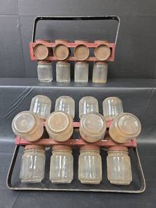 lot 671 image: Vintage Pair Rotating Jar Bottle Nail Organizers