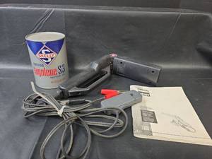 lot 727 image: DIS Automotive Timing Light Tool with Unopened Skelly Oil Can