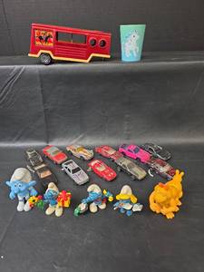 lot 779 image: 1980s Toy Collection - Smurf Figures, Diecast Cars & BUDDY L Pressed Steel Brute Horse Trailer
