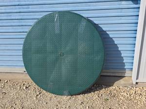 lot 74 image: 38in Round Green Textured Patio Table with 4 Legs