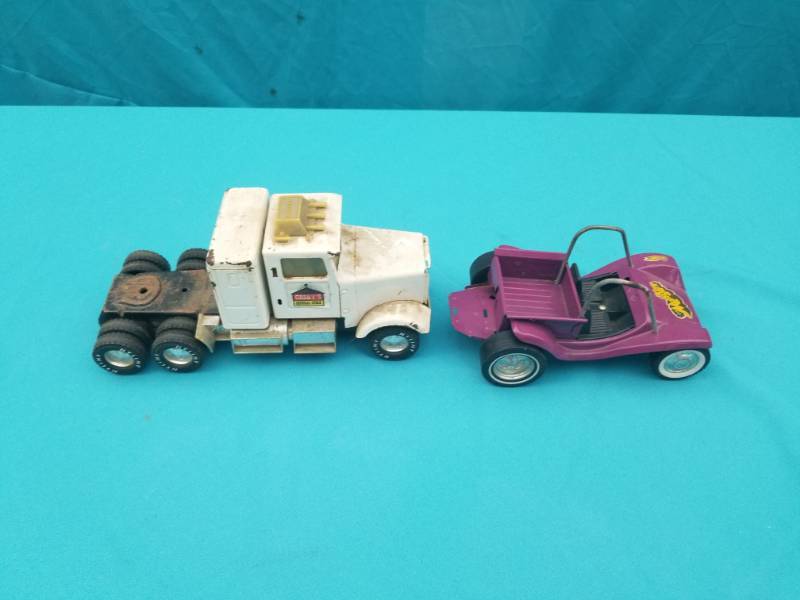 lot 8034 image: The Modster and Caseys Big Rig Die Cast Cars