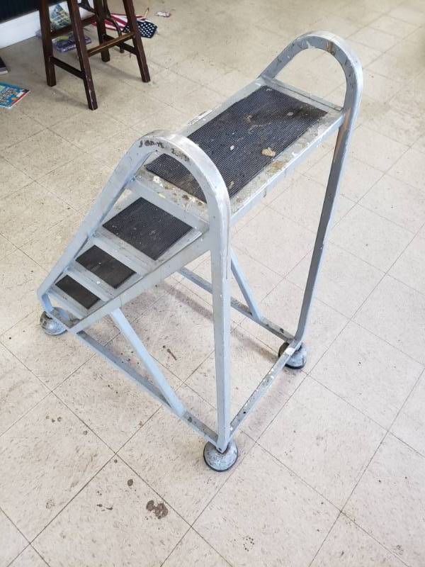 lot 8106 image: Rolling Commercial Ladder