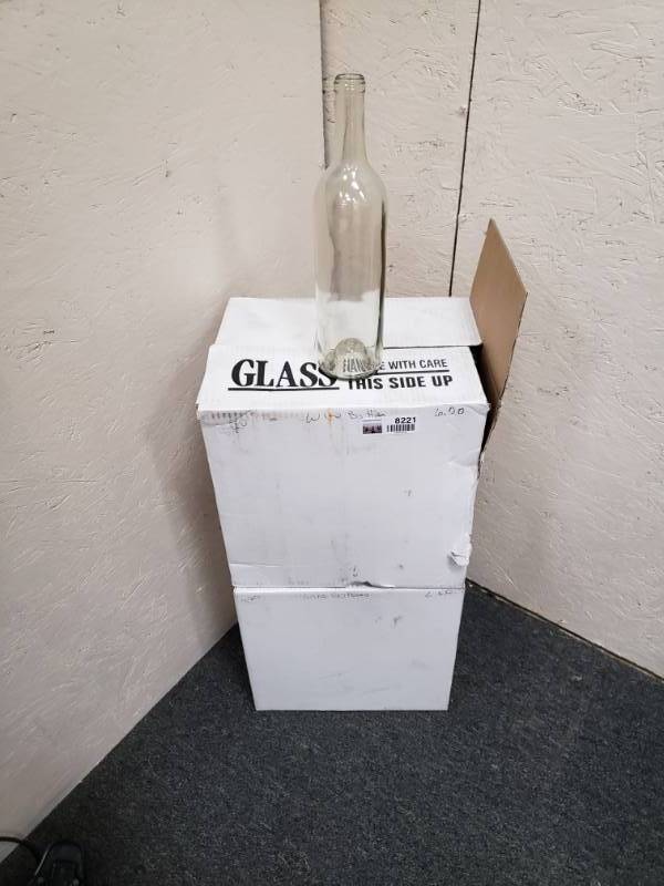 lot 8221 image: Case of Glass Bottles