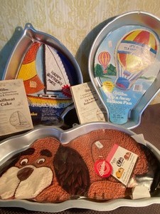lot 124 image: Cake Pans - Sail Boat 84, Upn Away Balloon 82 and Puppy 86