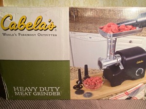 lot 147 image: Cabelas Heavy Duty Meat Grinder, New in Box