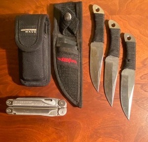 lot 166 image: Leatherman Multi-Tool and 1995 Hibben Throwing Knives in Cases
