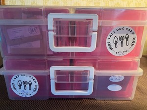 lot 184 image: Plastic Totes Filled w Seeds