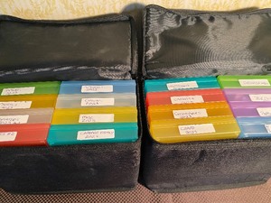 lot 216 image: Canvas Storage w Plastic Inserts Filled w Seeds