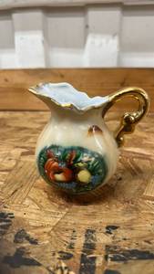 lot 522 image: Decorative Porcelain Creamer with Floral Design