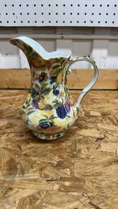 lot 555 image: Decorative Floral Porcelain Pitcher, 9 inches tall