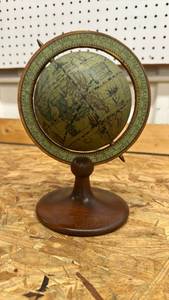 lot 556 image: Decorative World Globe with Wooden Base, approximately 9 inches tall