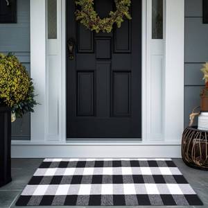 lot 13615 image: PIXFAIRY Buffalo Plaid Area Rug - 3x5 Ft, Black and White Checkered, Washable Cotton, Ideal for Front Porch, Kitchen, Entryway, Patio, Bathroom