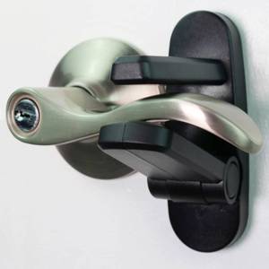 lot 14434 image: Door Lever Lock (4 Pack) Prevents Toddlers from Opening Doors. 3.25 L  1.5in W  4.5in H Easy One Hand Operation for Adults. Durable ABS with 3M Adhesive Backing. Simple Install (Black)in