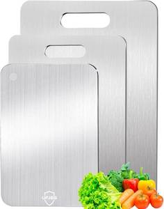 lot 18076 image: UFJEG Titanium Cutting Board, 3 PCS Titanium Cutting Boards for Kitchen, Non Toxic, Double-Sided Food Grade Chopping Board for Outdoor Camping(15.6 x 11in, 13in x 9.3in, 11.8in x 7.8in)in