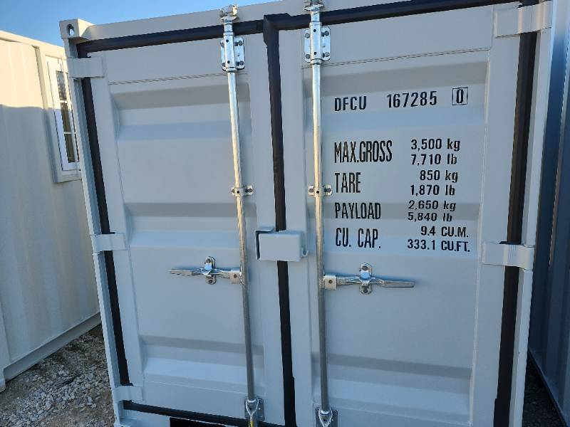 lot 9915 image: 10ft Shipping Container with Window and Door  DFCU 1672850