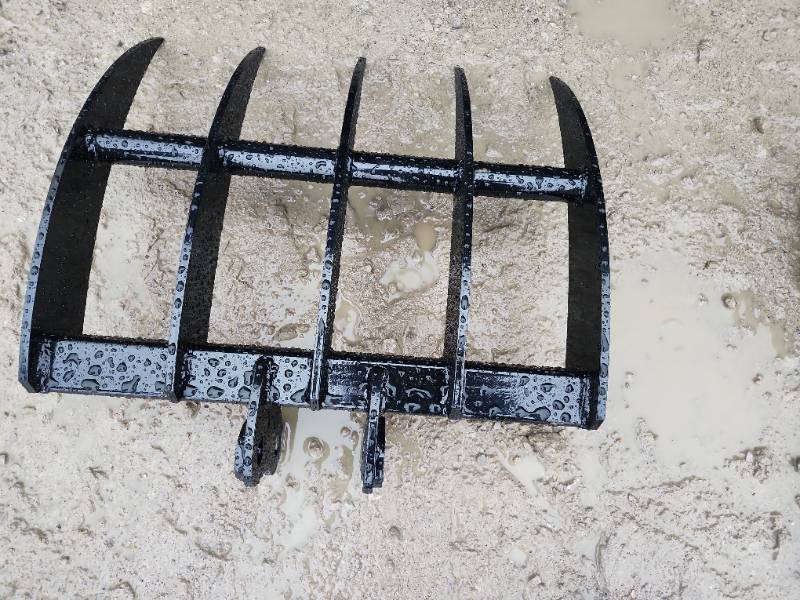 lot 11519 image: Unused Mini Excavator Rake  Fits 12 Ton Excavators