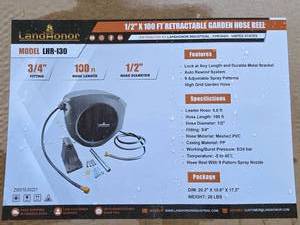 lot 2805 image: Landhonor 12 inch x 100ft Retractable Garden Hose Reel