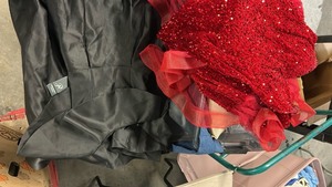 lot 354247 image: Large Sterile Mixed Tote Of NEW With Tag Clothes including 3 Designer Formal Dresses-Sequined Red and Purple Evening Gown-Long silk black  - Retail $300