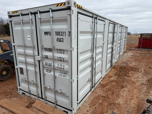 lot 1125D image: First Use 40 foot High Cube Container with 4 sets of side doors and 1 set of rear doors.  Very good condition.  MMPU1083217
