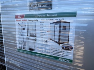 lot 1129D image: Unused 2025 K1522 Full Portable Bathroom with Shower  Sink, Toilet, Shower, Exhaust Fan, Window and lockable door, Very Nice Set up