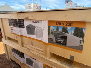 lot 1111D image: Unused 12x20 Single GarageMetal Shed Cream in Color Fully Enclosed Side Wall Carport