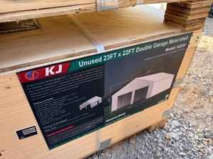 lot 1414D image: Unused K2223 22 x 23 Double Garage Metal Building  Cream in color, 26 gauge sheet metal, No Garage Doors, Includes 1 walk through door. 13 ft height