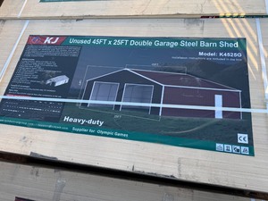 lot 1408D image: Unused K4525G 45 x 25 Double Garage Metal Building  Red-Brown in color, 26 gauge sheet metal, No Garage Doors, Includes 1 walk through door. 14 ft height