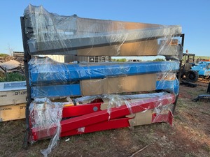lot 1255D image: Unused 10,000 lb Two Post Automotive Lift -Assorted Colors, Choice of remaining Red, Blue or Grey at load out only