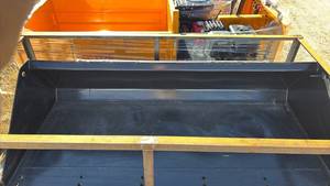 lot 1137 image: Unused 72-inch SD Lanch Skid Steer Loader Bucket, Toothless