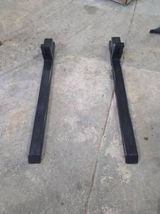 lot 2124 image: Wolverine TF2-66-4000g Non Adjustable Clip On Forklift Forks