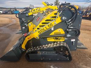 lot 1238 image: SDL L50 Mini Skid Steer Loader with 420cc Engine (joystick controls need replaced)