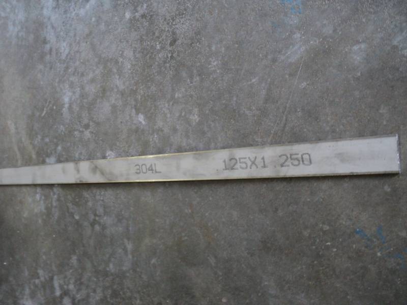 lot 2570 image: (1) piece 304L bar stock,  .125 X 1.250