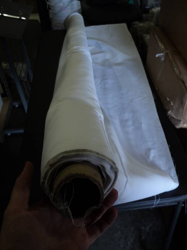 lot 2581 image: (1) roll white fabric 56 x 6 yards