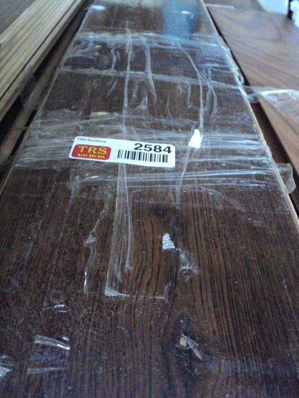 lot 2584 image: (8) planks engineered flooring, oak color