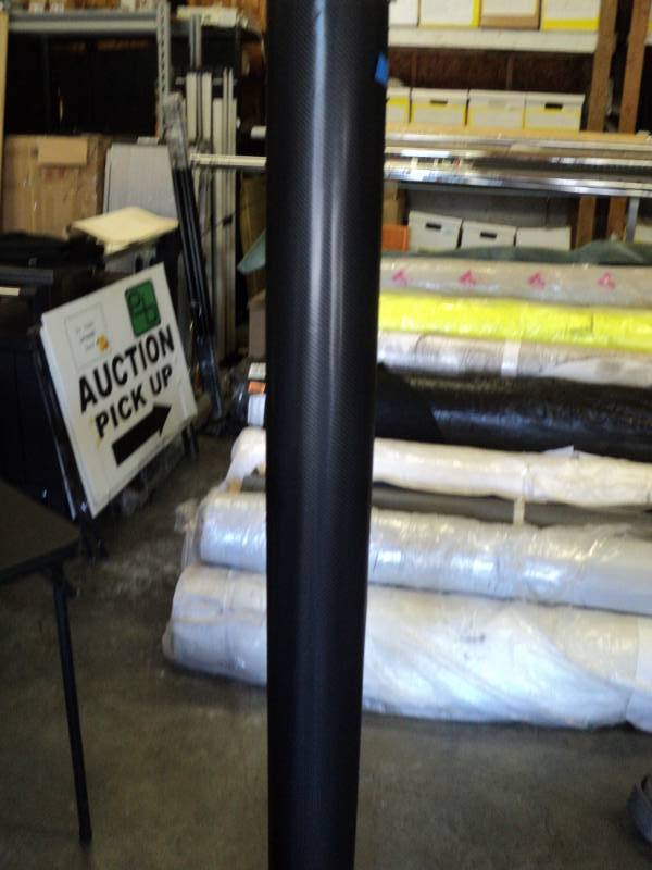 lot 2614 image: (1) roll black sign vinyl,  adhesive back.