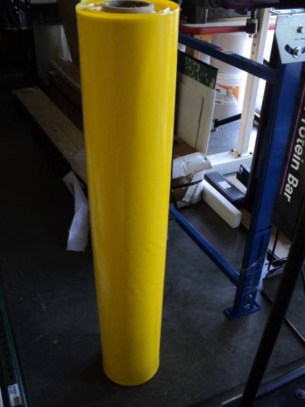 lot 2645 image: (1) roll of yellow trash bags,  32 gallon,  approximately 50 bags per roll
