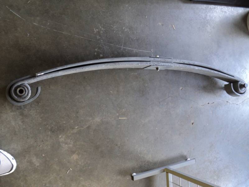 lot 2733 image: Large leaf spring with bushings