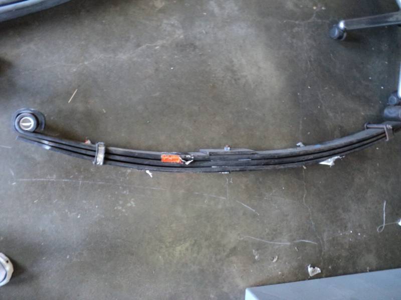 lot 2734 image: Large leaf spring with bushings