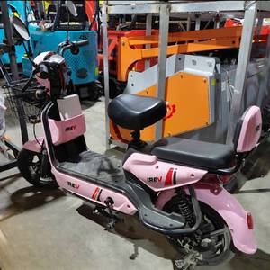 lot 5711 image: Assembled For Pics - Unused High End Two Wheel Electric Vehicle w Storage Basket - Color Pink - Long Lasting Battery - Powerful Motor - Carbon Steel Frame - High Gloss Paint - One Buton Start - Dual Remotes - Broke Pedal, See Pics