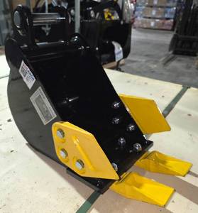 lot 5601 image: Unused Mini Excavator Tooth Bucket  Fits 12 Ton Excavators - Reinforced Side Plates, Durable Wear-Resistant Steel Construction, and a Multi-Tooth Cutting Edge for Improved Digging Performance