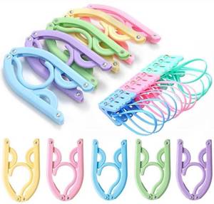 lot 8035 image: 20 Pcs Travel Hangers with 12 Pcs Clips Cruise Ship Essentials Portable Folding Clothes Hangers Travel Accessories Foldable Clothes Drying Rack