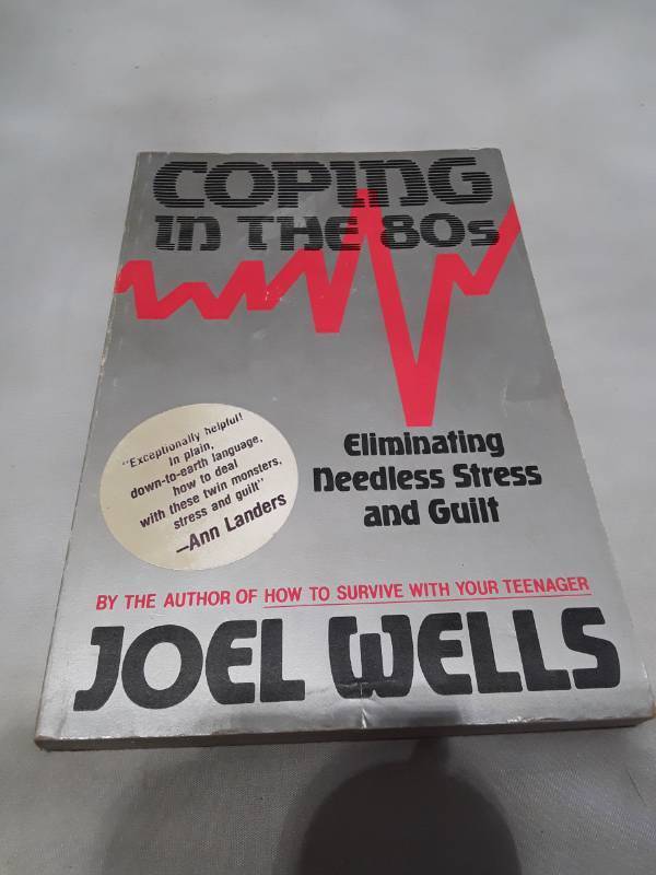 lot 11128 image: Coping in the 80s Eliminating Needless Stress and Guilt by Joel Wells (1986)