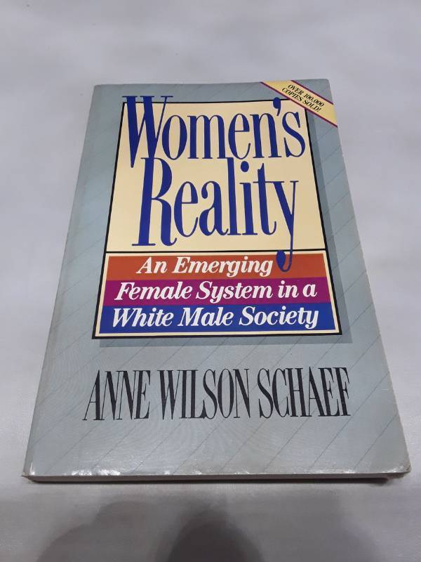 lot 11159 image: Womens Reality by Anne Wilson Schaef (1985)